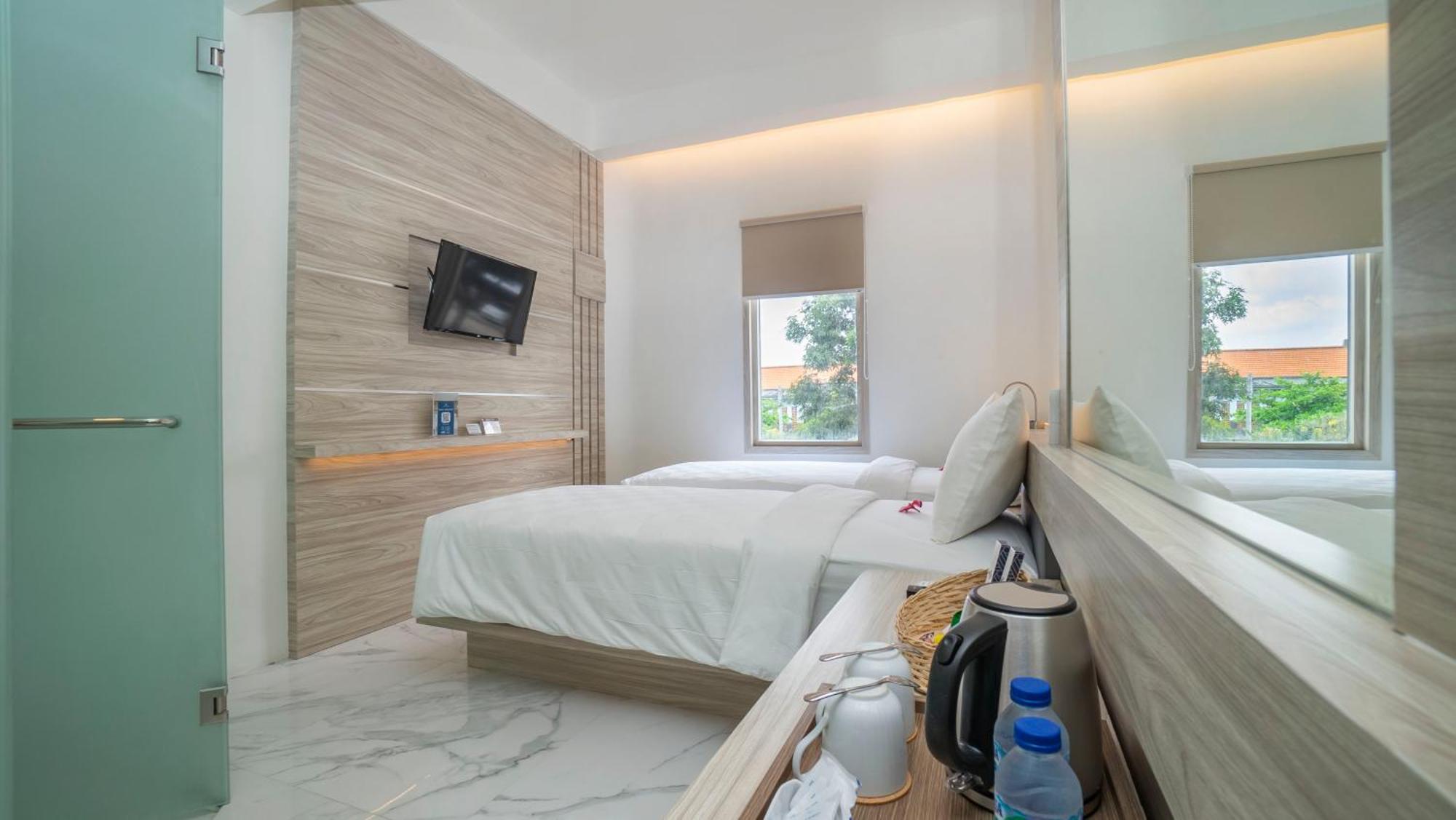 City Of Aventus Hotel - Denpasar Chambre photo